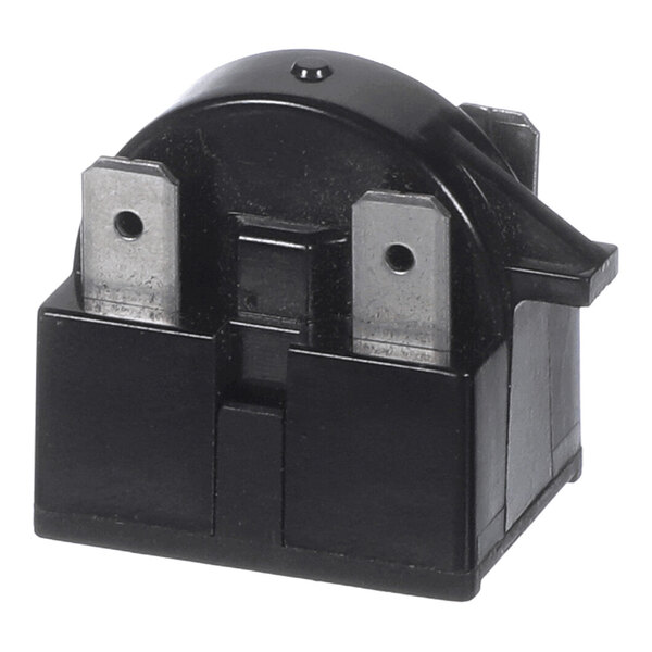 A black rectangular electrical relay with two metal prongs and a curved top.