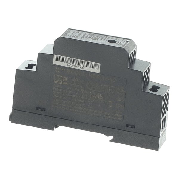 A black, rectangular electronic device with a stepped design, ventilation slots, and a barcode label on one side.