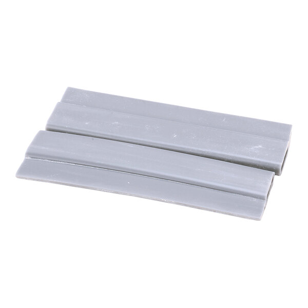 Two gray, rectangular, flat plastic or rubber-like strips placed side by side on a white background.