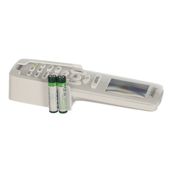 A white remote control with a display screen and several buttons, shown alongside two AA batteries.