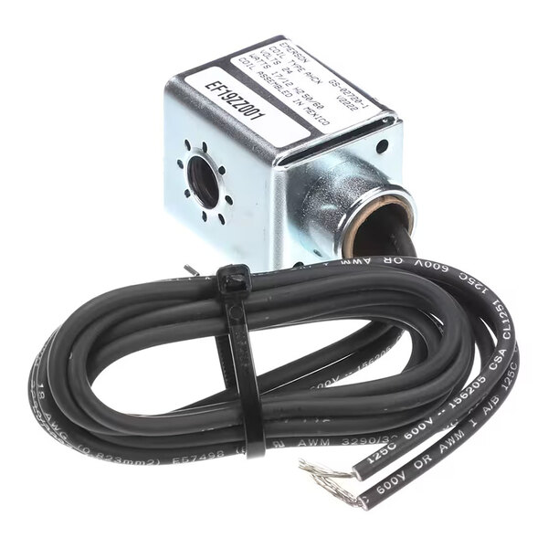 A metallic solenoid coil with a label on top and an attached black electrical wire coiled neatly beside it.