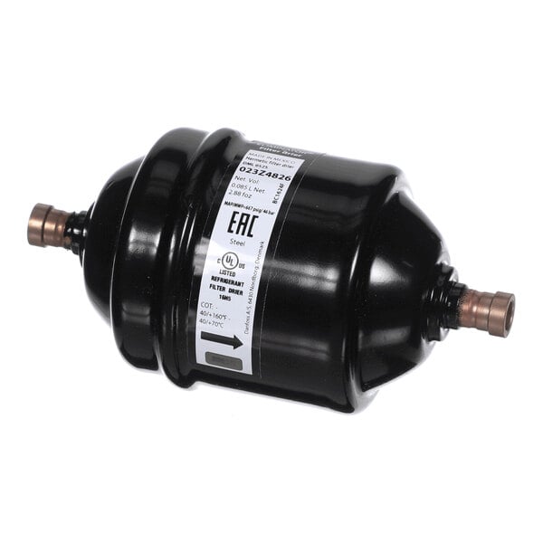 A black cylindrical metal component with copper fittings on both ends and a label with technical information attached to its side.