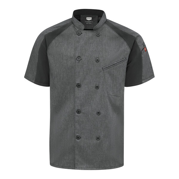A short-sleeve, double-breasted, charcoal gray chef coat with black raglan sleeves and a chest pocket.