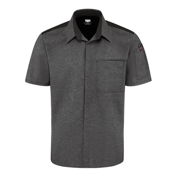 A short-sleeve, button-up charcoal shirt with black shoulder accents, a chest pocket, and a pen pocket on the left sleeve.