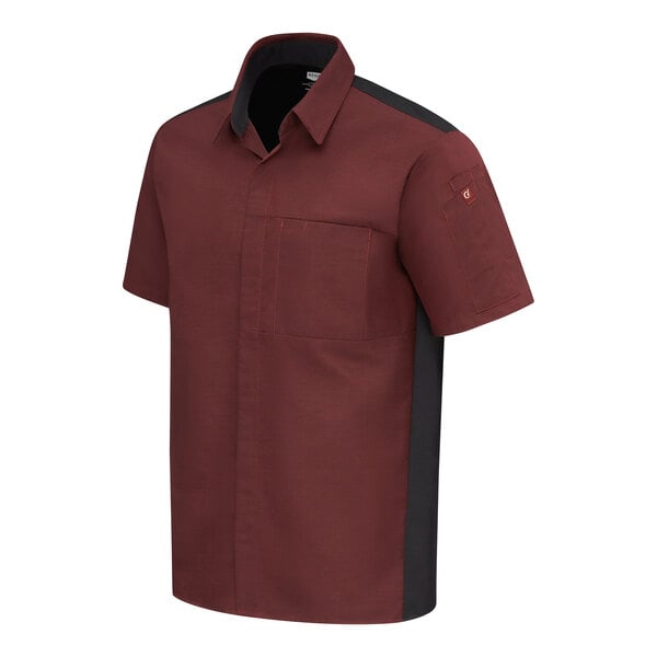 A short-sleeve button-up shirt in a dark red color with black side panels and a chest pocket.