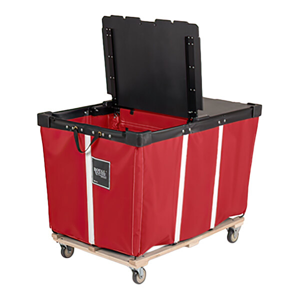 A large red vinyl basket truck with a black hinged lid, mounted on a wooden base with four caster wheels.