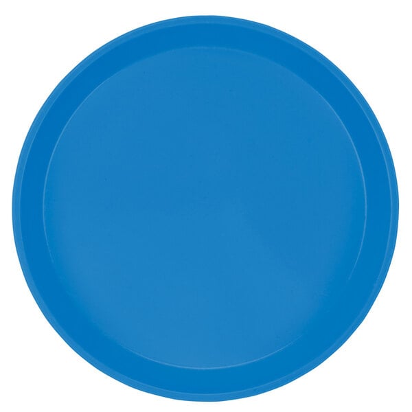 A close-up of a blue Cambro round fiberglass tray with a white background.