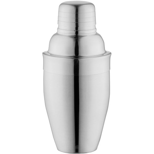 A shiny, metallic cocktail shaker with a smooth, reflective surface and a rounded cap.