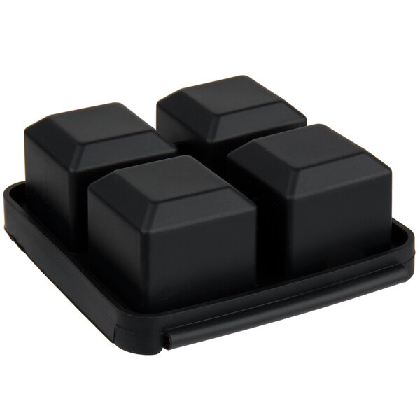 A black silicone mold with four large square compartments and a fitted lid.