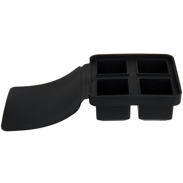 A black silicone mold with four square compartments and an attached flexible lid.