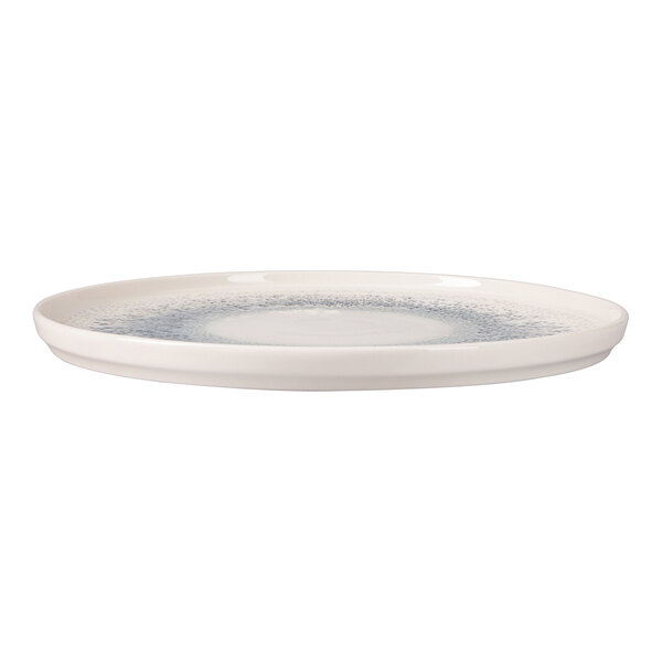 Oneida Noctra by 1880 Hospitality 6 5/16" Cream / Blue Round Porcelain Flat Plate - 6/Case