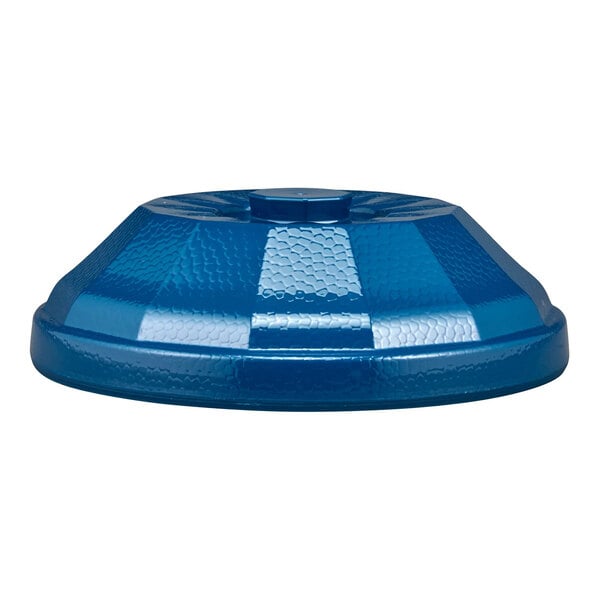 A blue, textured, dome-shaped plastic cover with a central knob, viewed from the side.