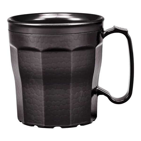 A black, textured mug with a handle and a faceted design.