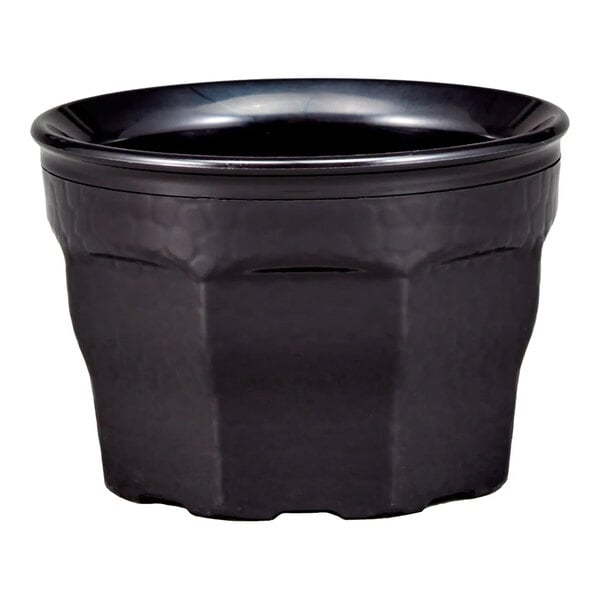 A black, round, textured bowl with a wide rim and stackable design.
