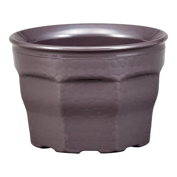 A small, round, smoked metal-colored bowl with a textured exterior and a wide rim.