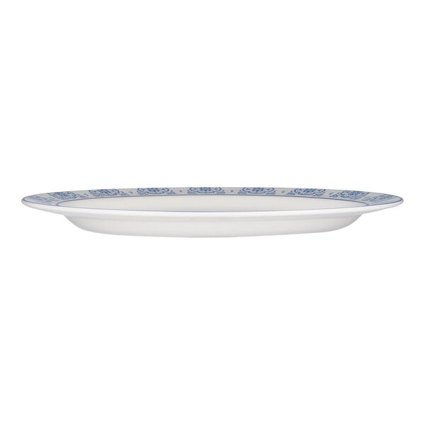 Libbey Lisbon 13 1/2" x 10 3/8" White Stackable Porcelain Oval Platter with Blue / White Patterned Rim - 12/Case