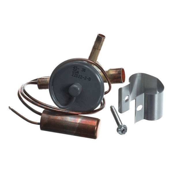 A metal valve assembly with copper tubing, a cylindrical component, a mounting bracket, and a screw, all placed on a white background.
