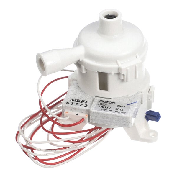 A white plastic component with attached wires and a label, featuring a cylindrical body and a spout-like extension.
