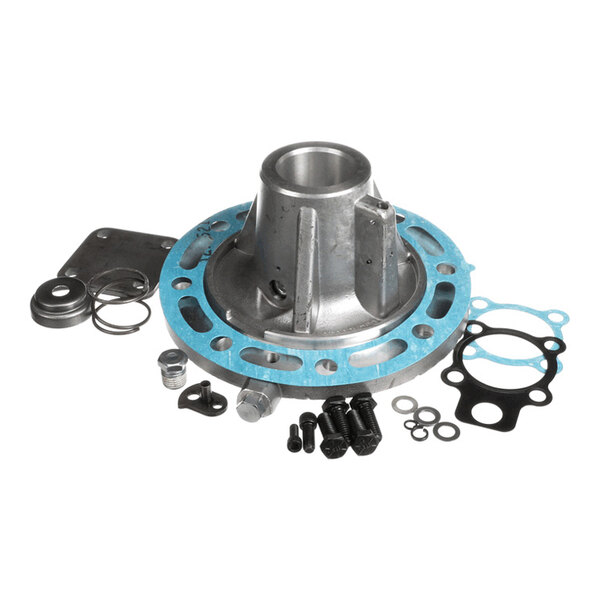 A metal mechanical component with a circular flange, surrounded by various gaskets, bolts, washers, and small metal parts.