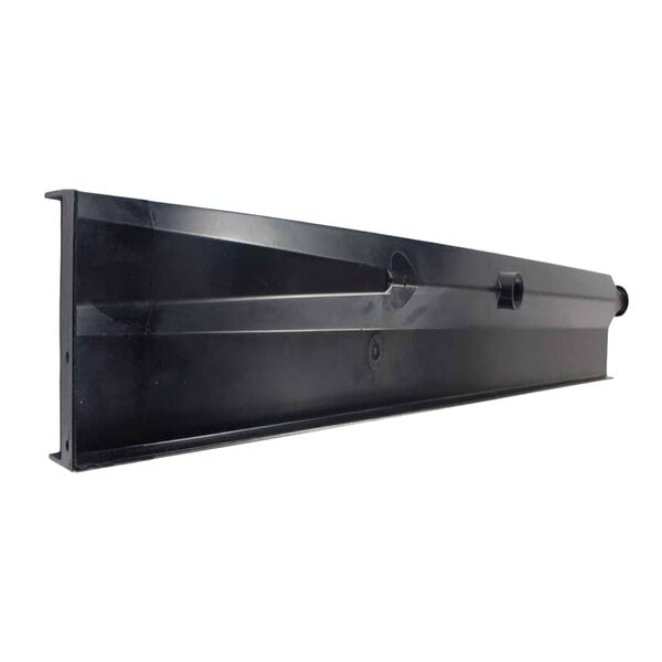 A black, rectangular plastic component with a slightly angled surface and molded features, viewed from a low angle.