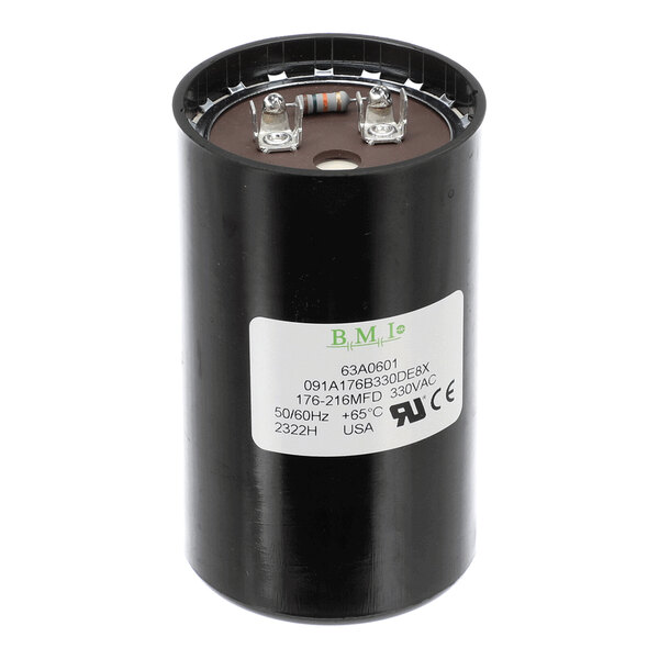 A cylindrical black capacitor with two metal terminals and a white label displaying technical specifications.