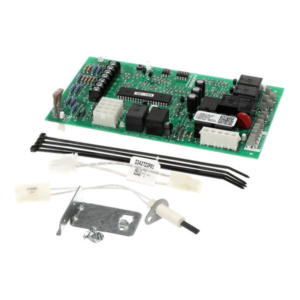 A green electronic circuit board with various components, accompanied by a white ignitor, metal mounting bracket, screws, wire harnesses, and zip ties.