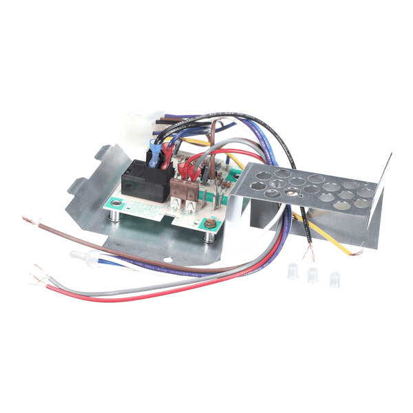 An electronic circuit board with attached wires, mounted on a metal bracket with a perforated metal cover and three small wire connectors nearby.