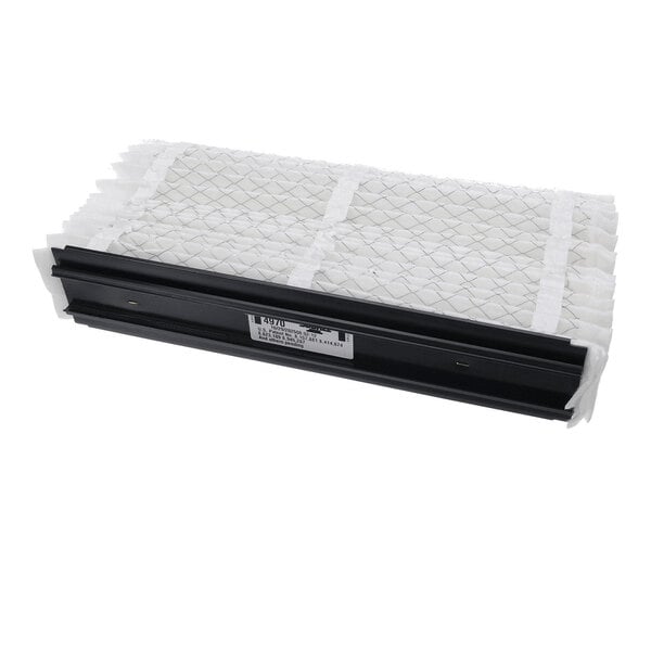 A rectangular air filter with a white pleated material and a black frame, viewed at an angle.