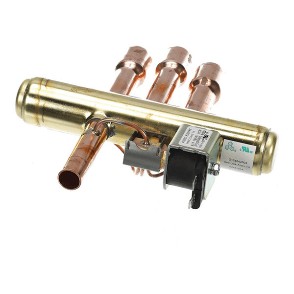 A metallic valve assembly with multiple copper pipe connections and an attached solenoid component.