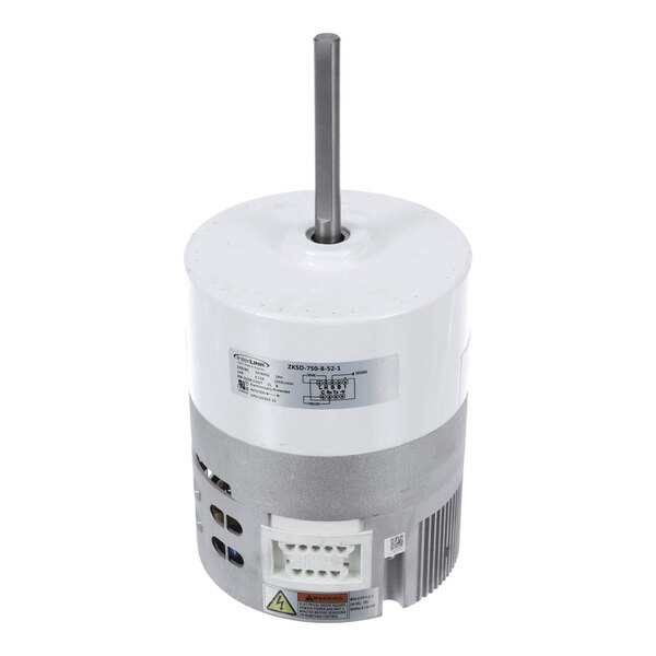 A cylindrical electric motor with a vertical shaft, white and metallic housing, and a connector port at the base.