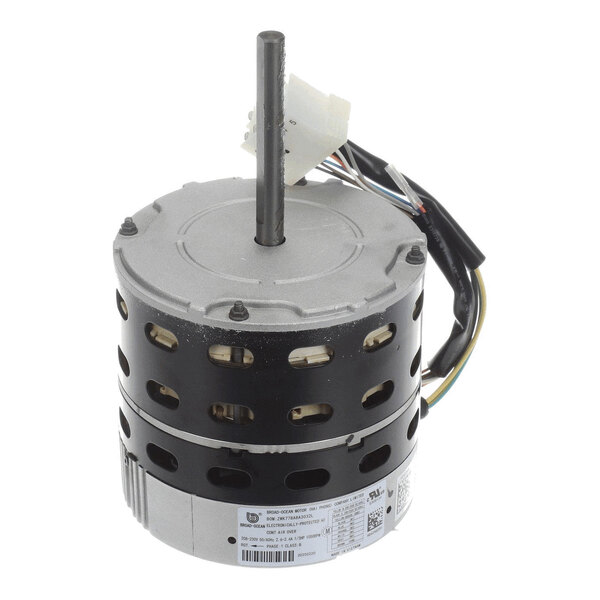 A cylindrical electric motor with a central shaft, ventilation holes, attached wires, and a connector.