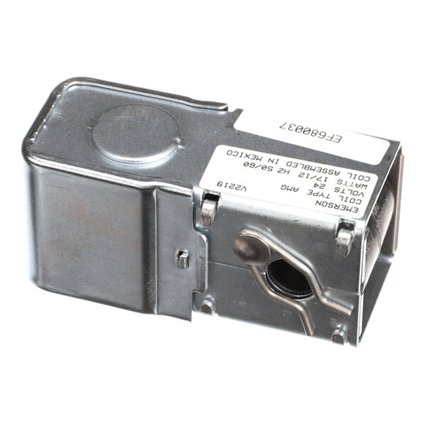 A rectangular metallic component with a label and a circular opening on one side, likely part of an industrial or HVAC system.