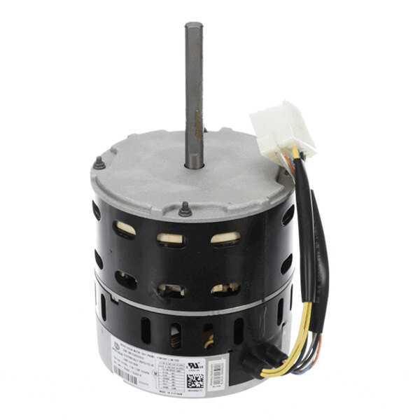A cylindrical electric motor with a central shaft, multiple ventilation slots, and attached colored wires ending in a white connector.