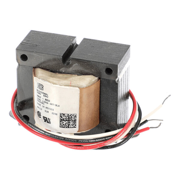 A metal-cased electrical transformer with a visible coil, label, and several colored wires extending from it.