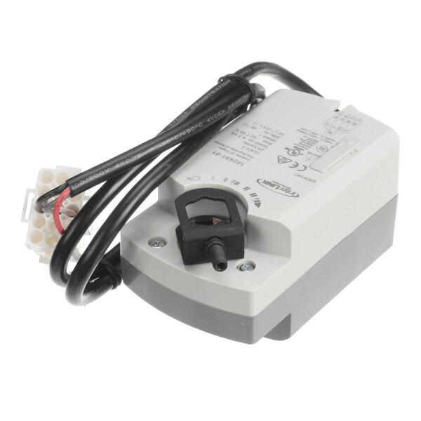 A rectangular electronic device with a rotary knob, attached wires, and a terminal block, likely used for controlling mechanical movement.