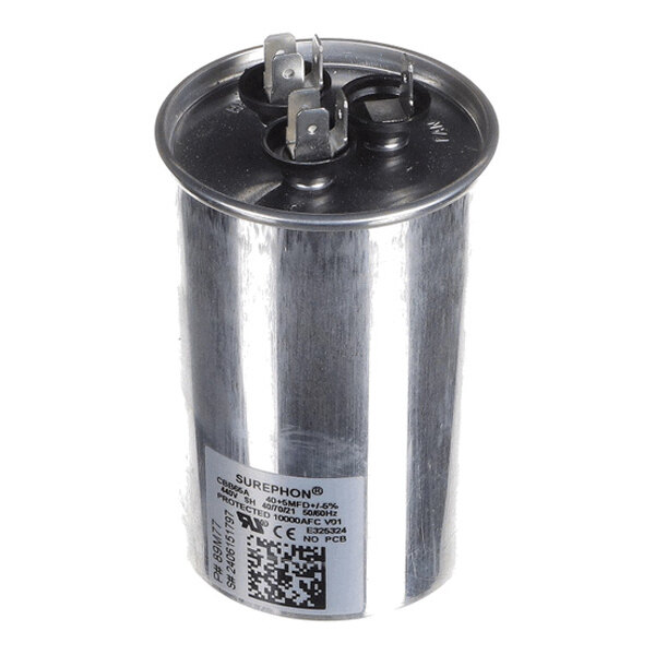 A cylindrical metallic component with three electrical terminals on top and a label with text and a QR code on the side.