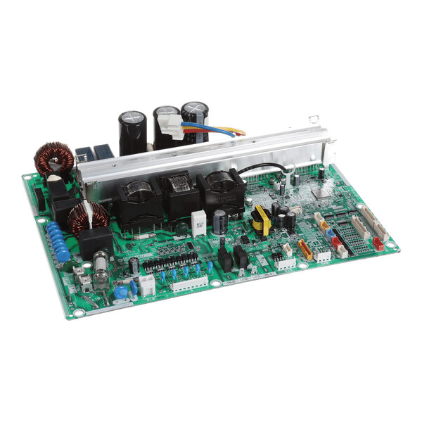 A green printed circuit board with various electronic components, including capacitors, coils, connectors, and relays, mounted on its surface.