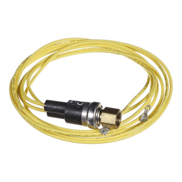 A yellow electrical wire with a black and metallic cylindrical component attached, featuring a brass fitting and terminal connectors.