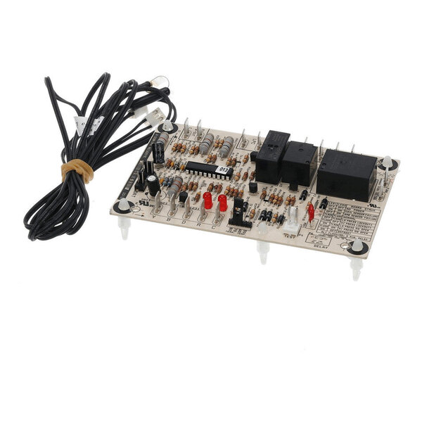 An electronic circuit board with various components, including resistors, relays, and LEDs, accompanied by a bundled black wire with connectors.