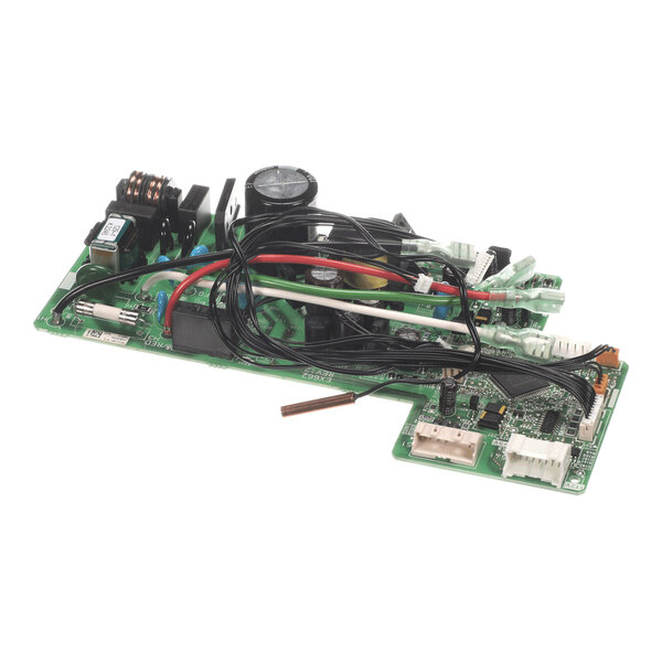 A green printed circuit board with various electronic components, wires, and connectors attached.