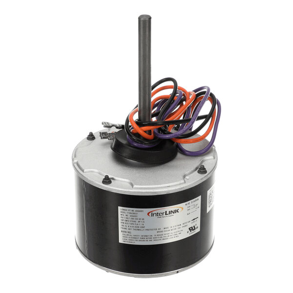A cylindrical electric motor with a central shaft and several colored wires extending from the top.