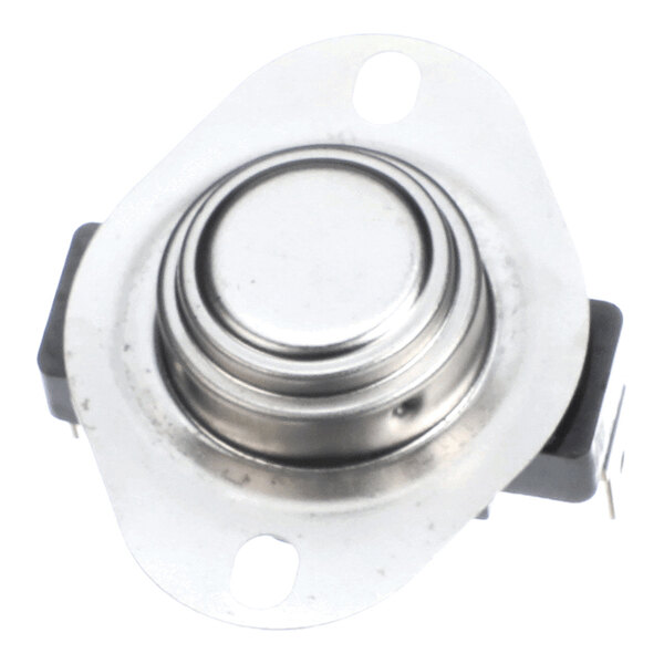 A close-up view of a round metallic component with a flat top and two mounting holes on a flange, likely an electronic or mechanical part.