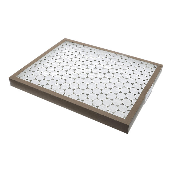 A rectangular air filter with a brown frame and a grid of circular white filter material.