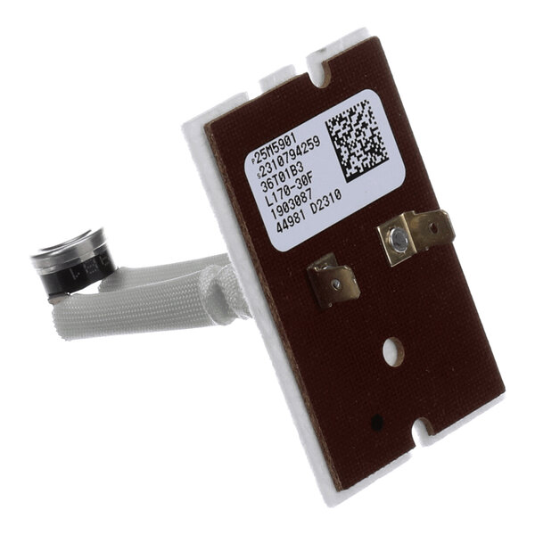 A rectangular electronic component with a brown circuit board, two metal terminals, a white label with printed text and a QR code, and a cylindrical metal sensor attached by a white insulated wire.