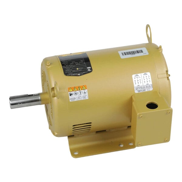 A yellow cylindrical electric motor with a metal mounting base, a protruding shaft, and several labels and warning stickers on its body.