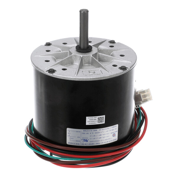 A cylindrical electric motor with a central shaft, multiple colored wires, and a label on the side.