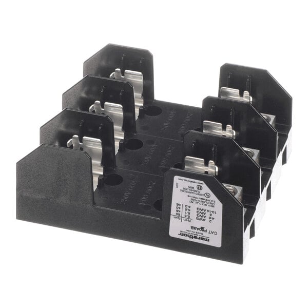 A black three-pole fuse block with metal connectors and a label on the front right side.