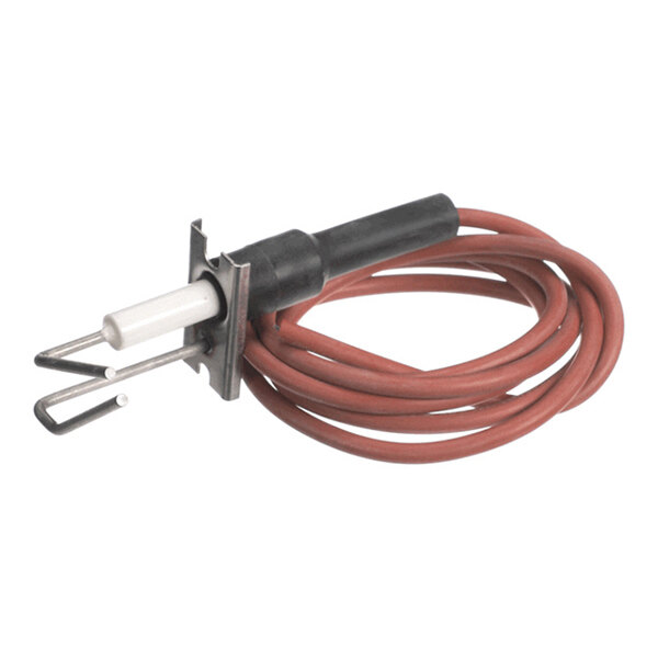 A coiled red wire attached to a metal and ceramic component with a black connector and two metal prongs.