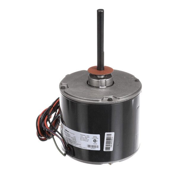 A cylindrical electric motor with a central shaft, attached wires, and a label on the side.