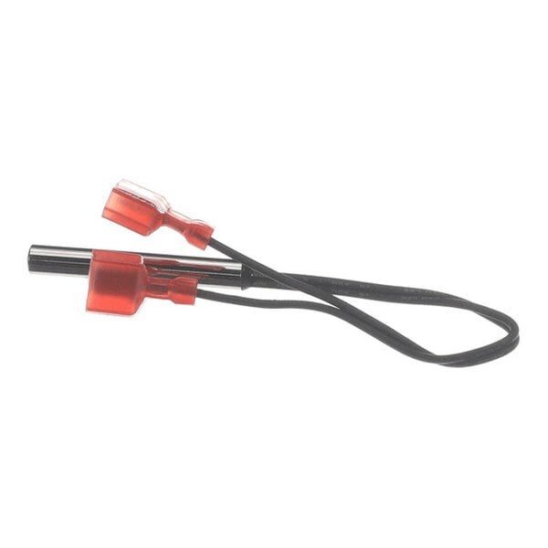 A small cylindrical electronic component with two black wires ending in red insulated connectors.